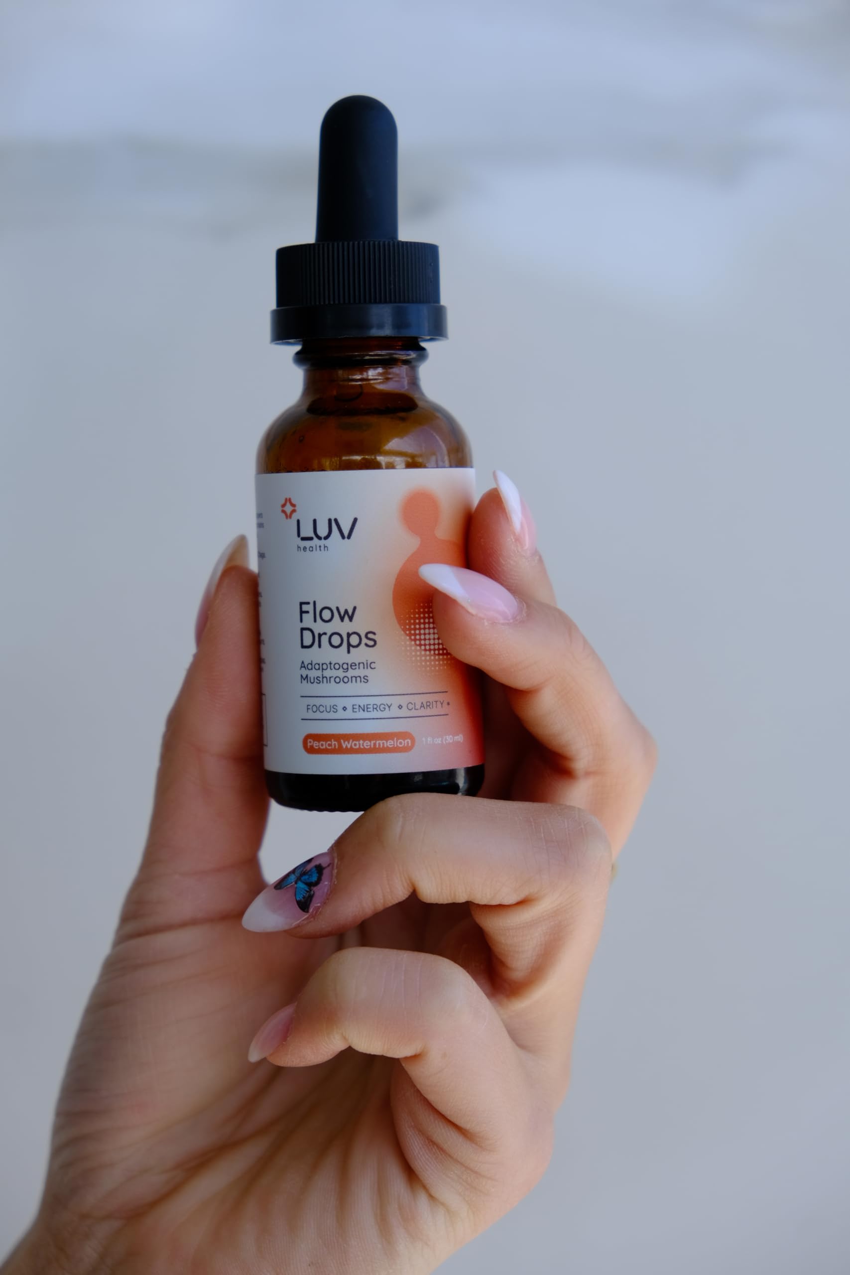 LUV health Flow Drops daily routine idea with glass bottle