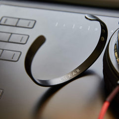 LUXAR close-up titanium detail highlights durable, lightweight construction for daily wear.