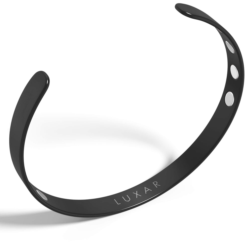 LUXAR titanium-brushed bracelet on the wrist for everyday durability and style.