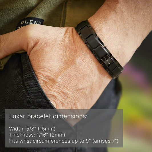 Luxar titanium magnetic link assembly close-up showing secure, powerful magnets