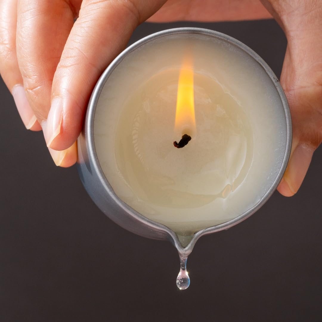 LUXMASA massage candle travel-friendly tin fits on nightstands or bags.
