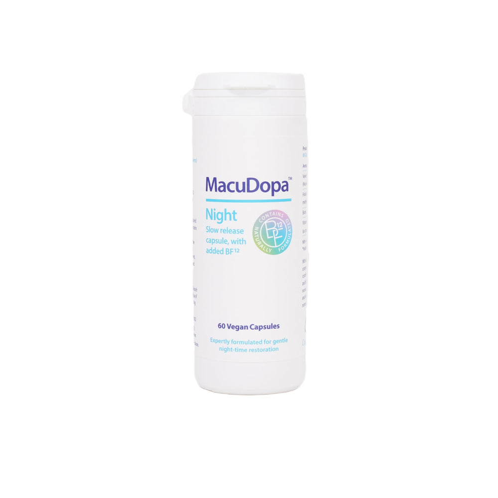MacuDopa Night capsules bottle on a nightstand for a smoother nightly routine.
