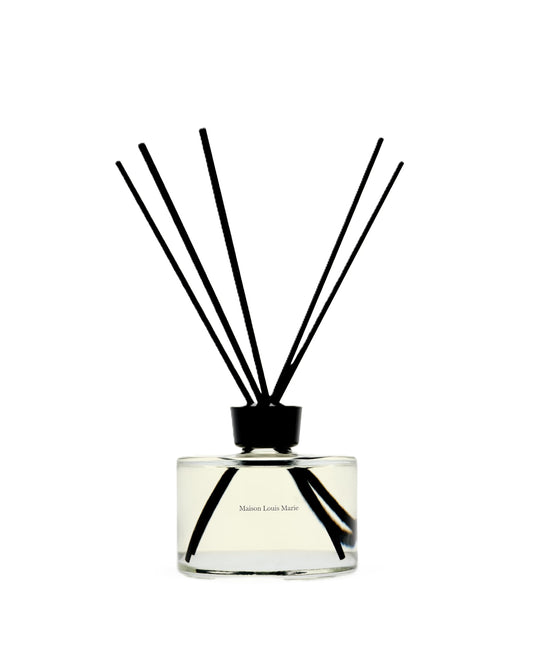 Maison Louis Marie No.14 Icila diffuser bottle on a clean surface for refined ambience.