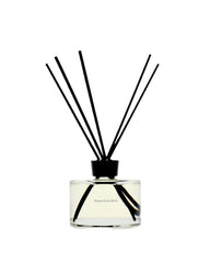 Maison Louis Marie No.14 Icila diffuser bottle on a clean surface for refined ambience.