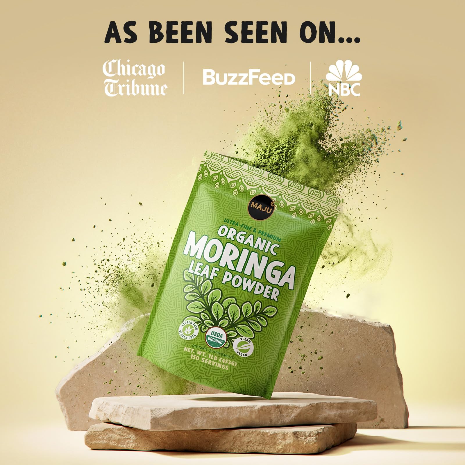Spoon of MAJU moringa powder on breakfast bowl.
