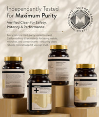 Manna Vitality Ormus+ capsules pour beside glass of water.