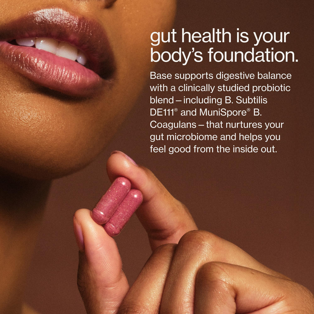 MAUDE Base capsules closeup highlighting probiotic pills