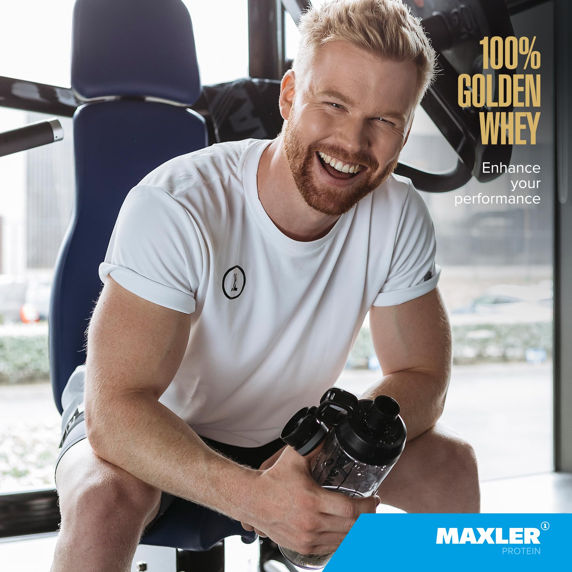 Person enjoying blueberry muffin shake after workout with Maxler 100% Golden Whey.