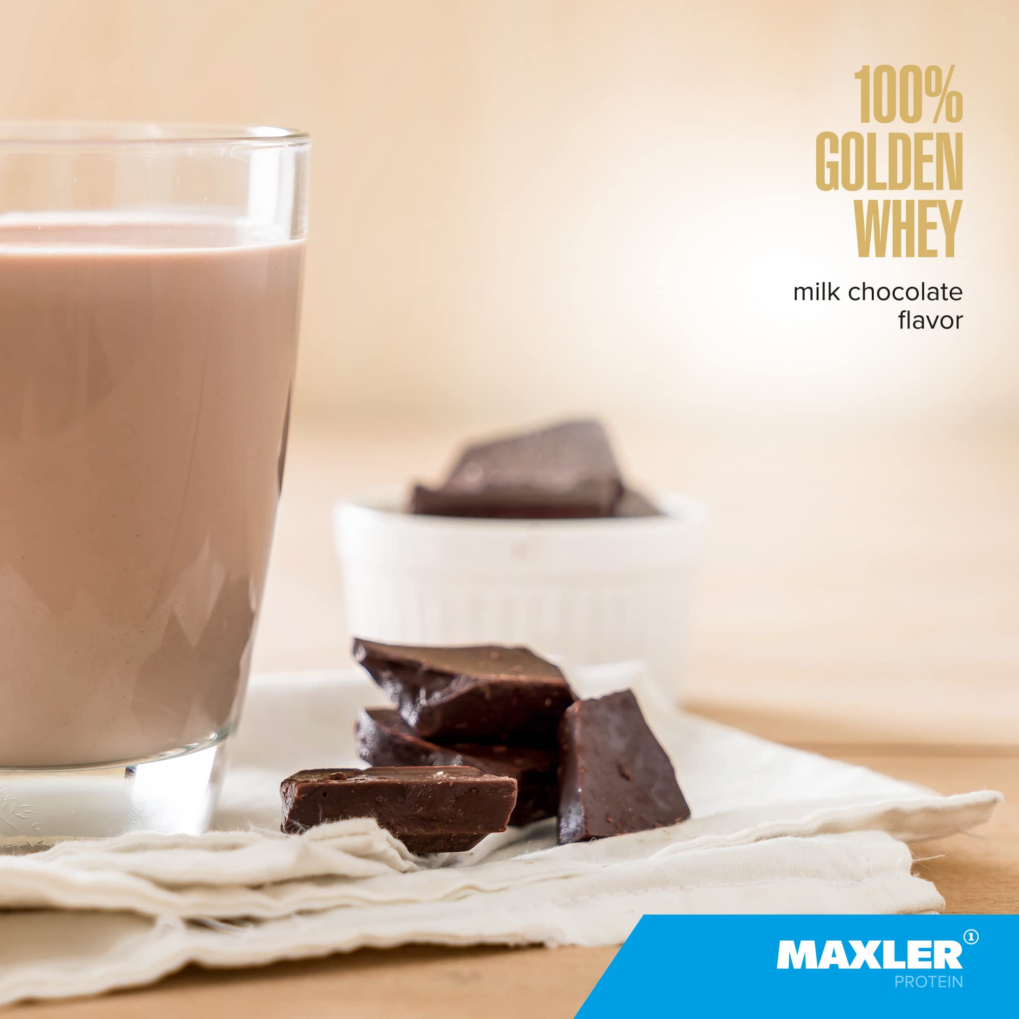 Maxler Golden Whey powder scoop shows easy protein measurement.