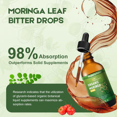 Glass of water with MaxuraFit Moringa Drops being stirred