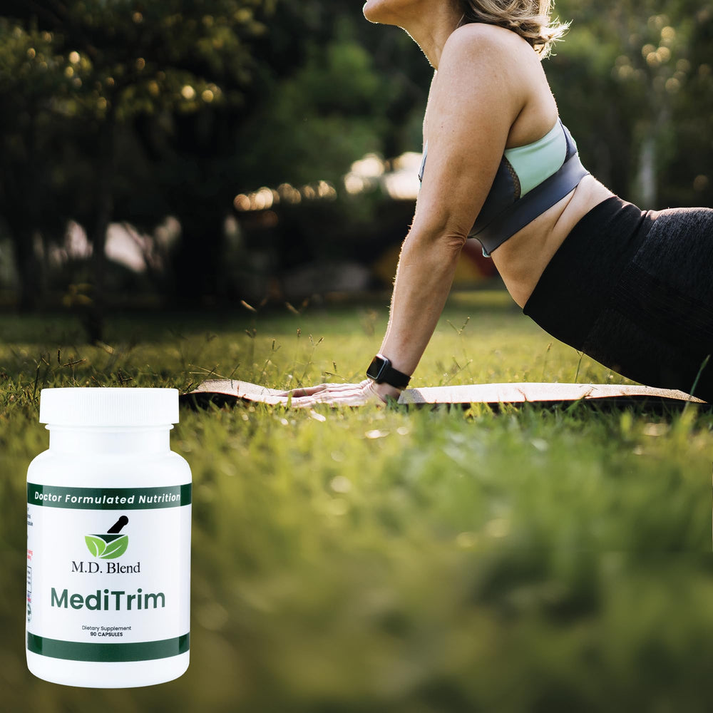 Glass of water with MediTrim capsules for easy dosing.