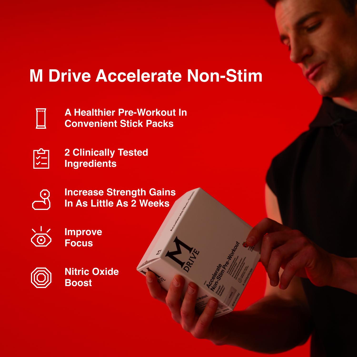 Mdrive Accelerate powder dissolving in water for a berry-flavored pre-workout drink.