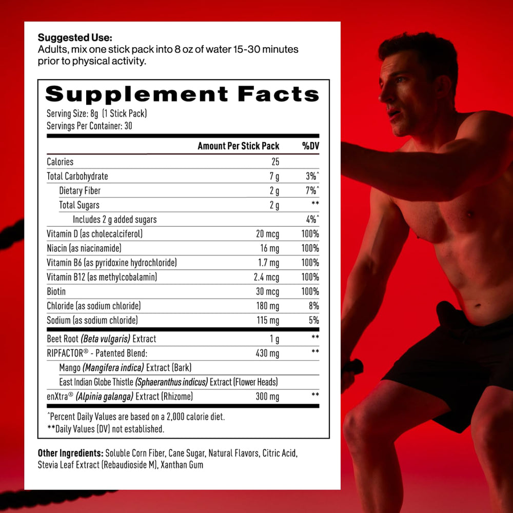 Mdrive Accelerate stick pack beside glass of water, convenient pre-workout preparation.