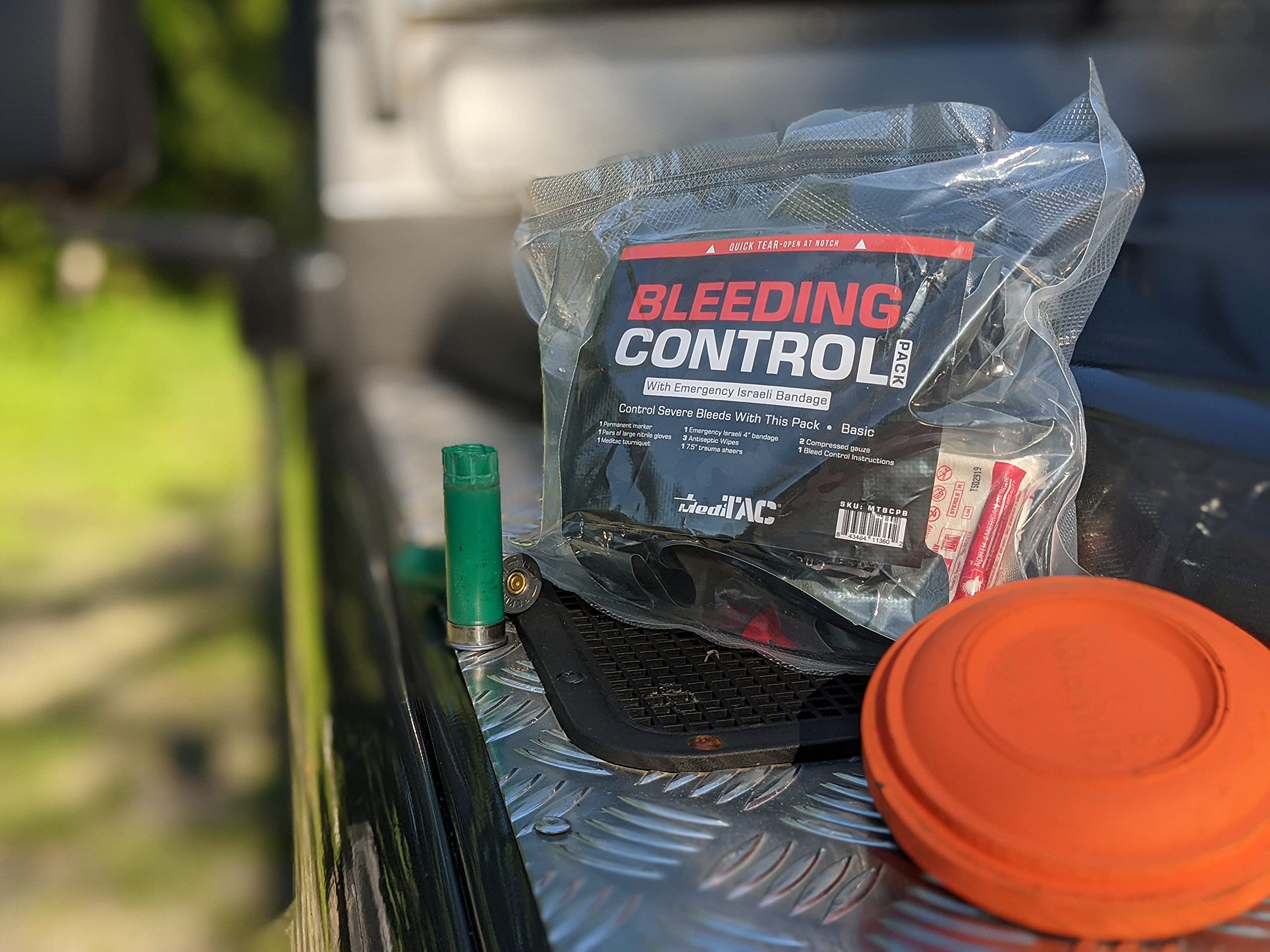 MediTac Basic Bleeding Control Pack nitrile gloves, shears, and marker for quick field use.