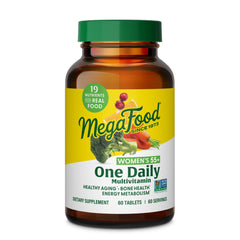 MegaFood Women Over 55 One Daily bottle on a clean surface supports daily vitality.