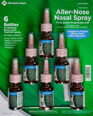 Member's Mark Aller-Nose nasal spray bottle close-up, compact design for travel-friendly use.