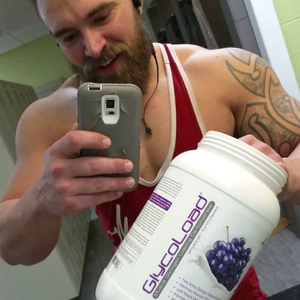 Shaker bottle with grape Glycoload ready for workout.