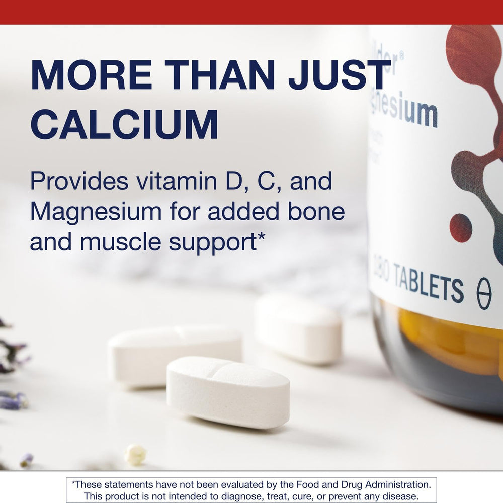 Metagenics Bone Builder tablets in hand, ready for daily bone health routine.