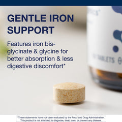 Metagenics Hemagenics tablets closeup highlighting the non-GMO formula.