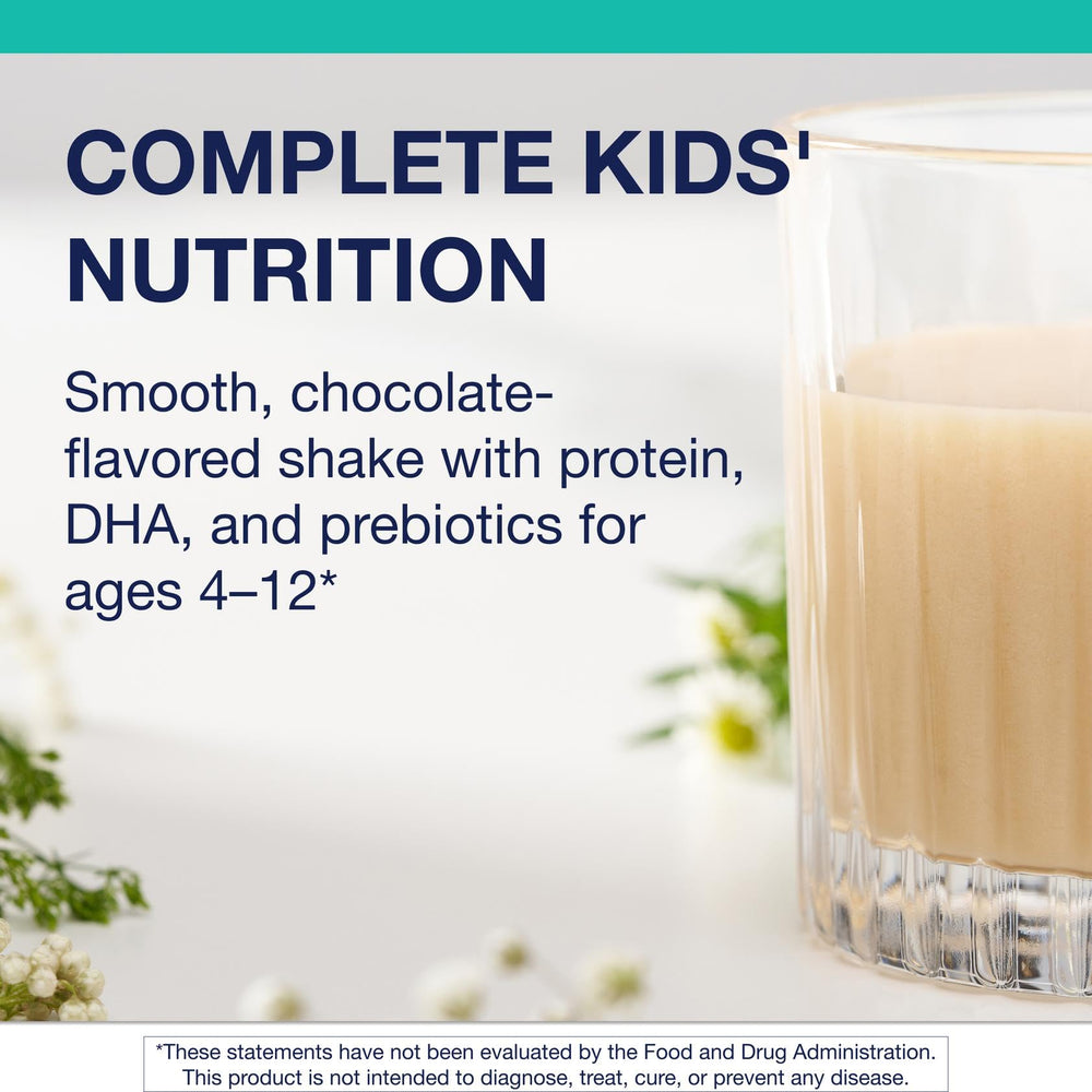 Metagenics MetaKids powder is being mixed into a glass of water.