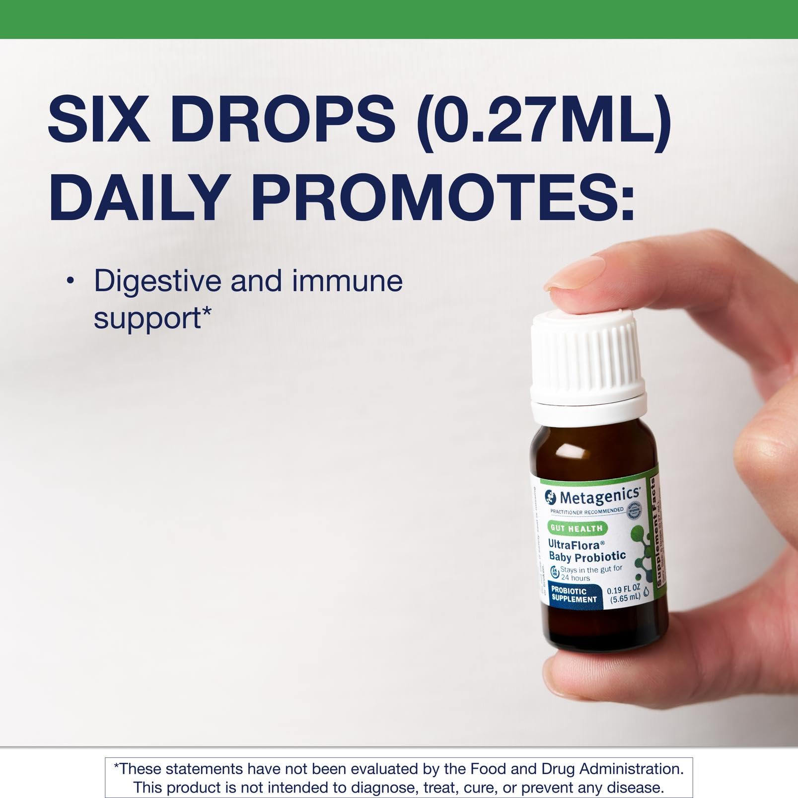 Metagenics UltraFlora Baby Probiotic dropper dispensing into a spoon for easy dosing