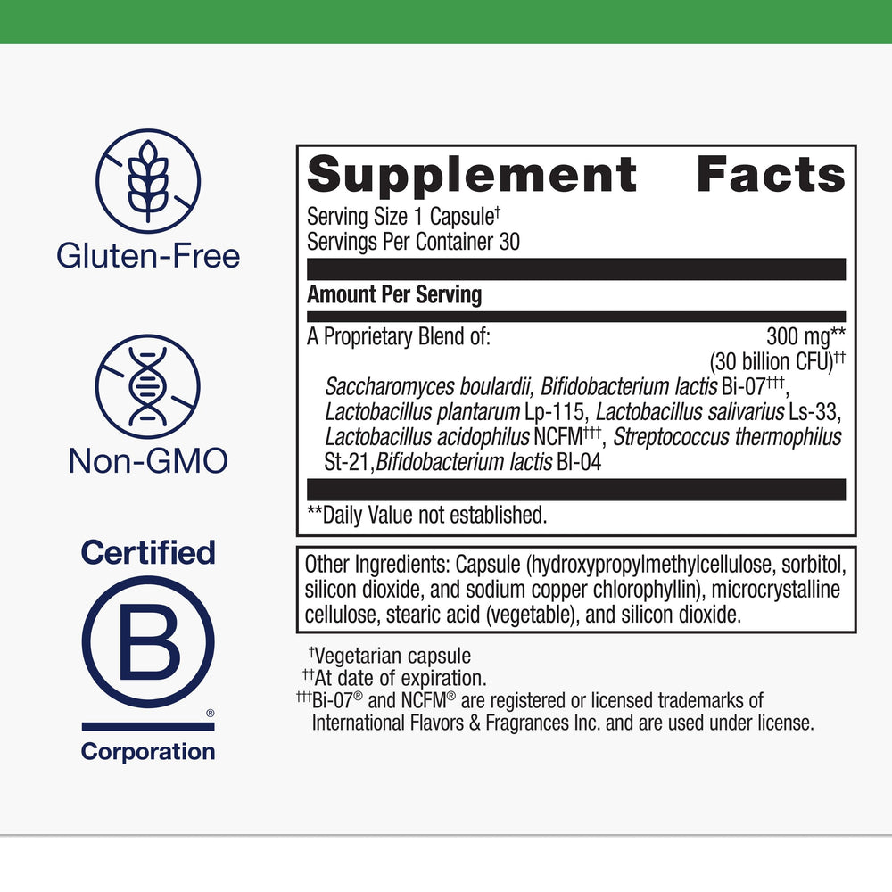 Metagenics UltraFlora Spectrum capsules in hand for on-the-go gut support