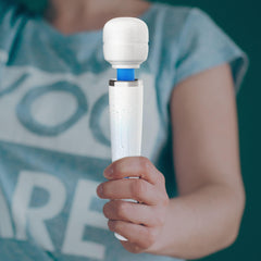 Metooka Portable travel massager laid out with case for on-the-go relief.