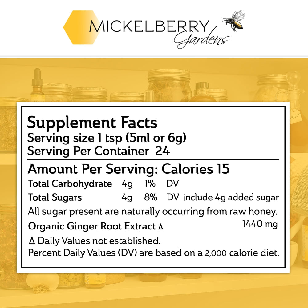 Close-up of Mickelberry Gardens label highlighting organic ginger and raw honey for natural wellness.