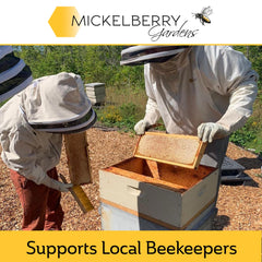 Spray action of Mickelberry Gardens Honey Propolis Throat Spray for throat discomfort
