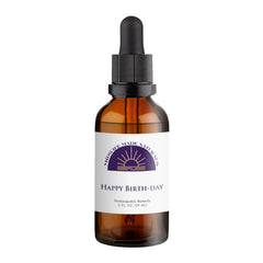 Midwife Made Naturals Happy Birth-Day bottle close-up showing natural, non-GMO drops for pregnancy preparation.