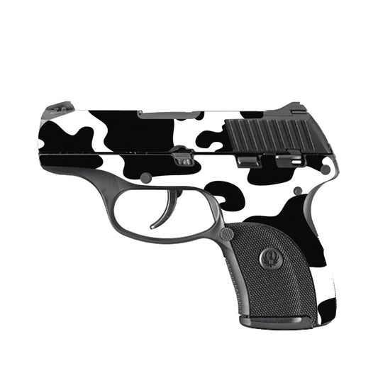 MightySkins Ruger LC9 cow print skin adds style and scratch protection.