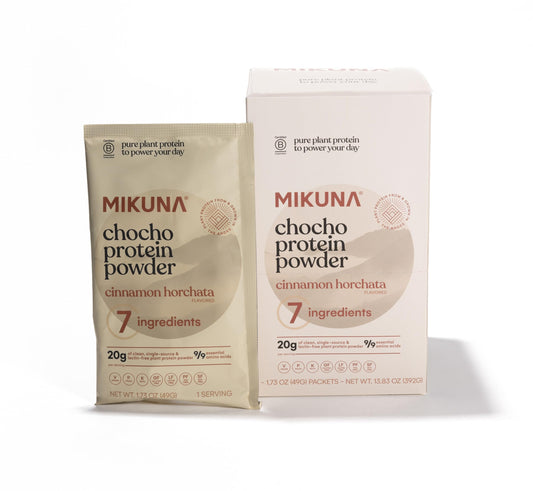 Mikuna Chocho protein tub on display, Cinnamon Horchata flavor for plant-based shakes.