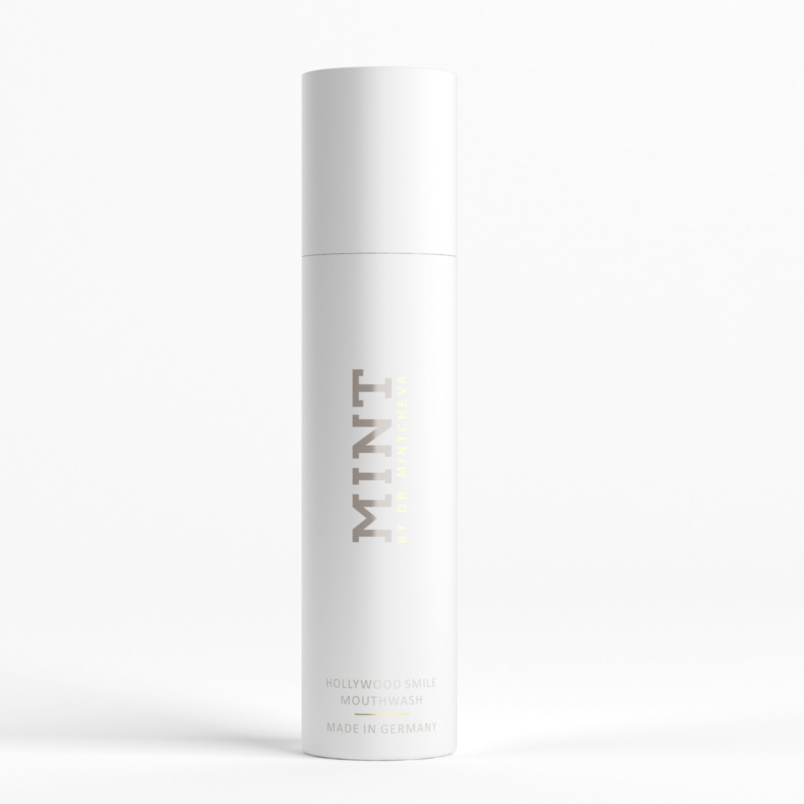 Closeup of Mint by Dr. Mintcheva Hollywood Smile bottle highlighting clean packaging