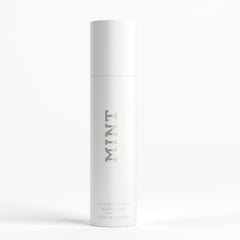 Closeup of Mint by Dr. Mintcheva Hollywood Smile bottle highlighting clean packaging