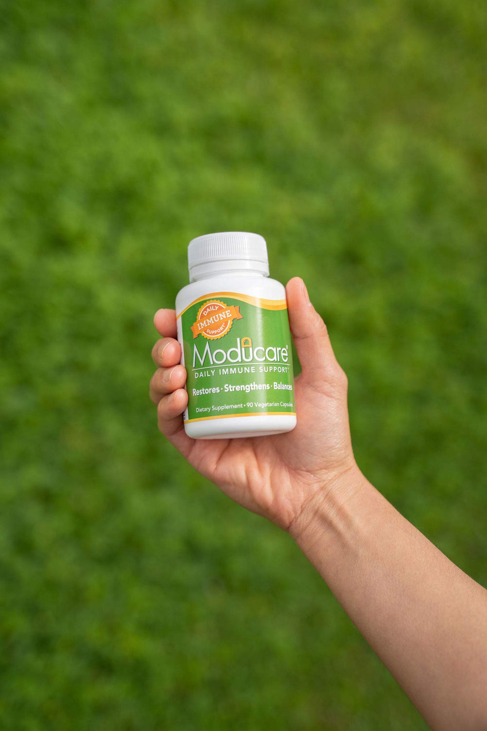 Moducare vegetarian capsules indicating natural origin ingredients.