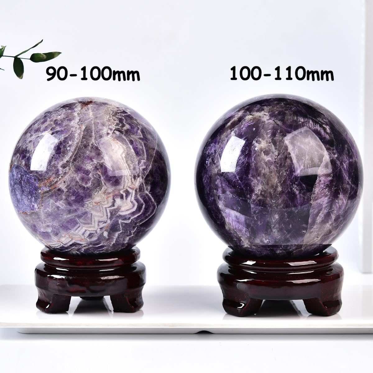 MOGEMT Side view of dream amethyst ball highlighting its size and beauty.