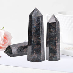 MOGEMT 30-day guarantee notice with Astrophyllite Obelisk packaging.
