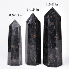 Hand-polished MOGEMT Astrophyllite Obelisk surface highlighting natural luster.
