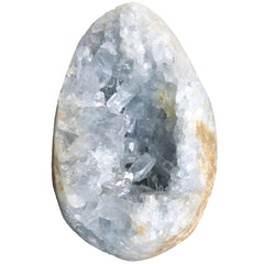 MOGEMT blue celestite geode table-top display enhances decor with tranquil blue glow.