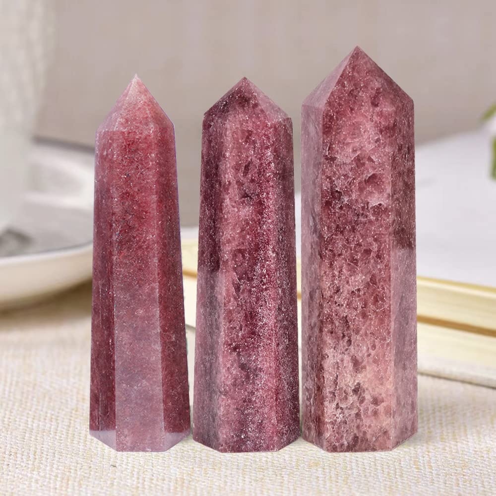 MOGEMT Strawberry Quartz Tower in hand demonstrates portable energy focus