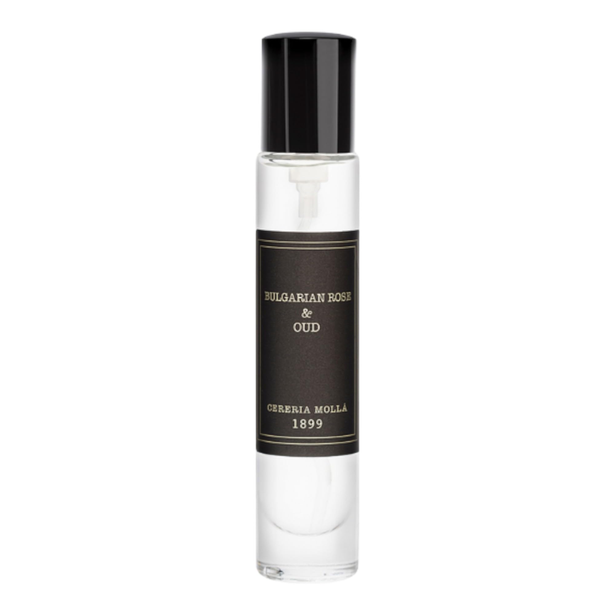 Molla 1899 handmade candle sits on shelf, elevating elegant room ambiance.