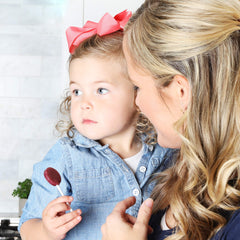 Momeez Choice brand logo representing mom-founded company.