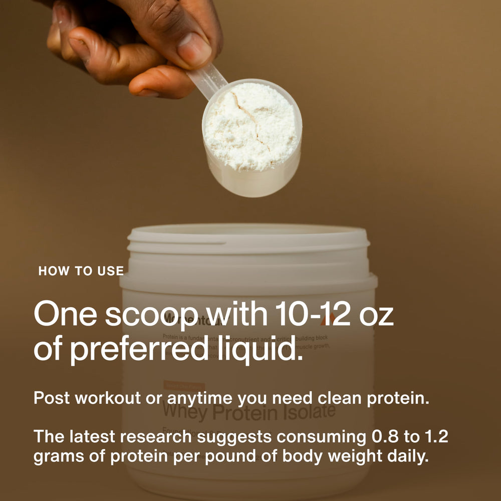 Momentous Essential Grass-Fed Whey Spiced Chai open tub with scoop for easy pre- or post-workout mix.