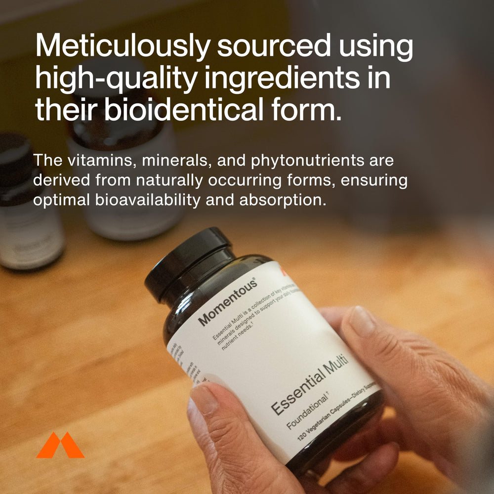 Momentous Essential Multivitamin serving scoop shows precise dose