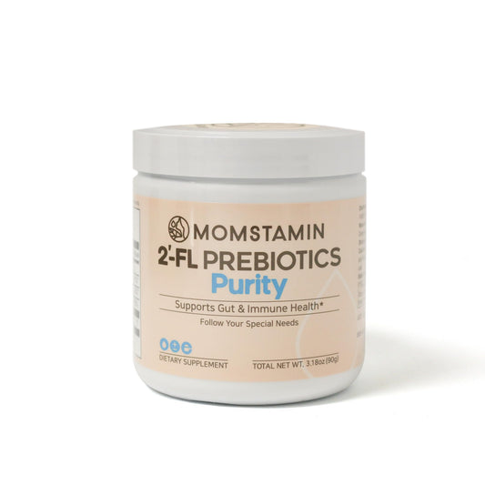 MOMSTAMIN 2'-FL HMO powder being poured into a drink for easy mixing.