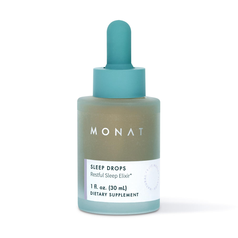 MONAT Sleep Drops bottle on nightstand promoting restful nights