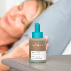 MONAT Sleep Drops in a relaxing bedtime scene for stress relief