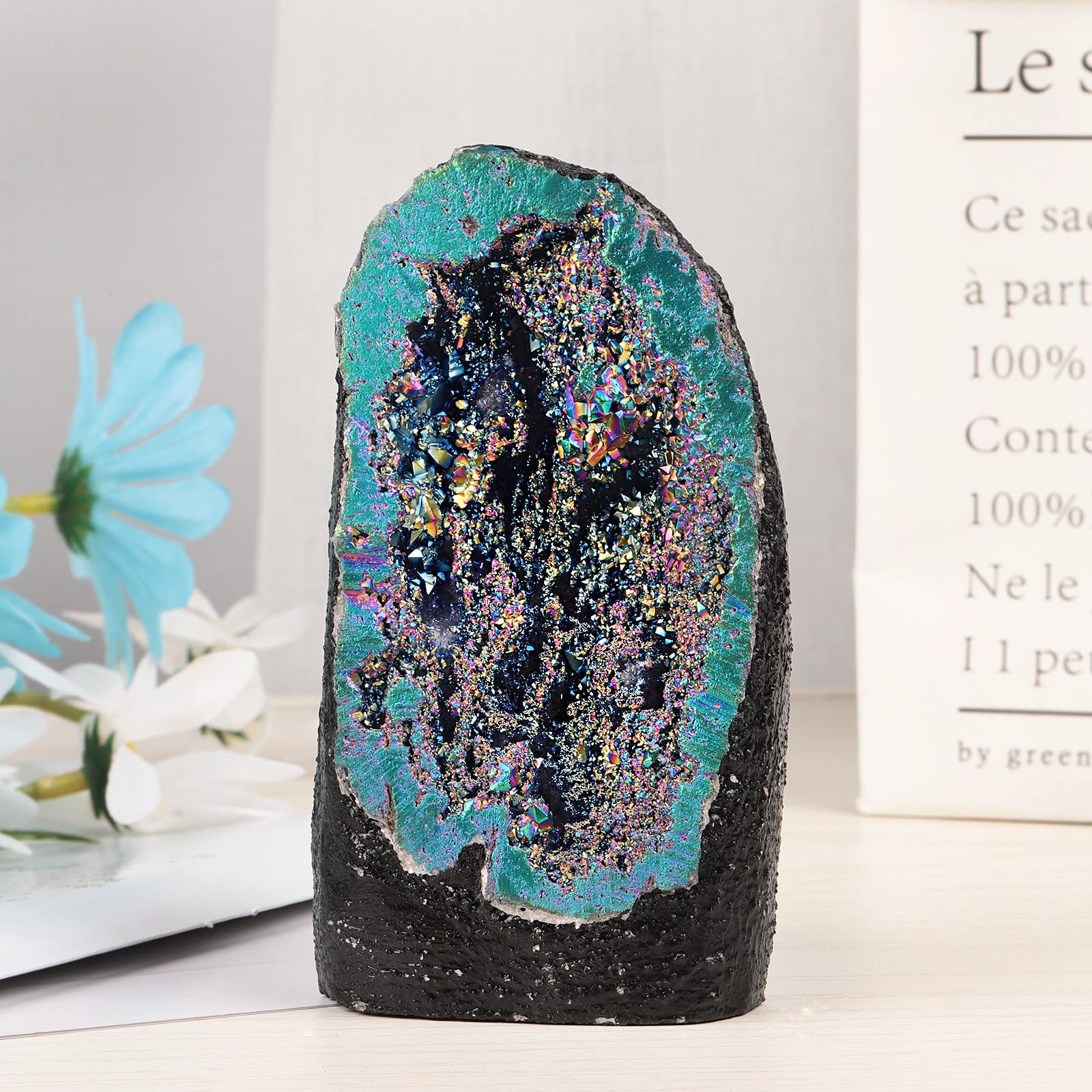 mookaitedecor Angel Aura Quartz geode cluster gleams in bright light, inviting feng shui energy