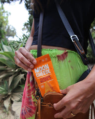 Moon Cheese Cheddar Believe It pantry staple—stocked for quick protein.