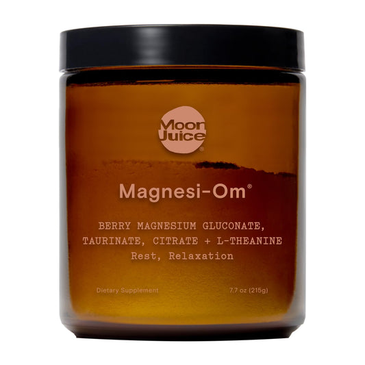 Moon Juice Magnesi-Om berry powder bottle ready for your nightly calm routine